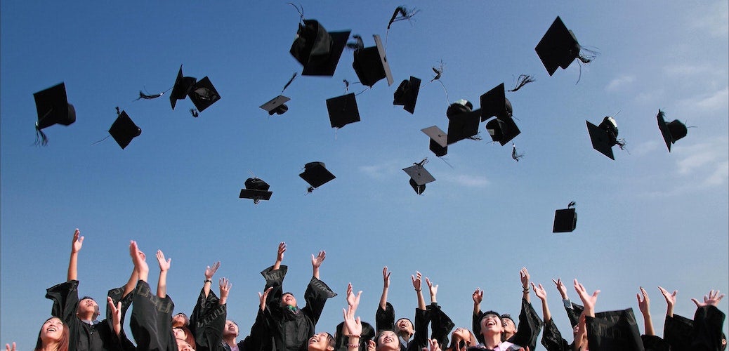 graduates-throwing-caps-in-the-air